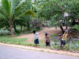 Kids playing along the street