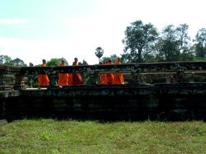 Monks on their way inside Angkor Wat