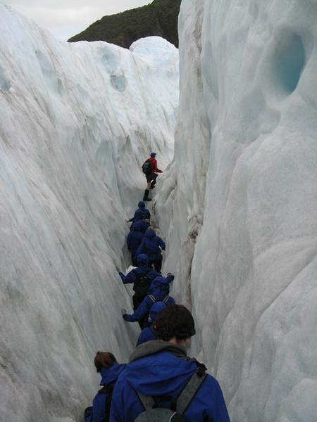 Group heading through crevasse