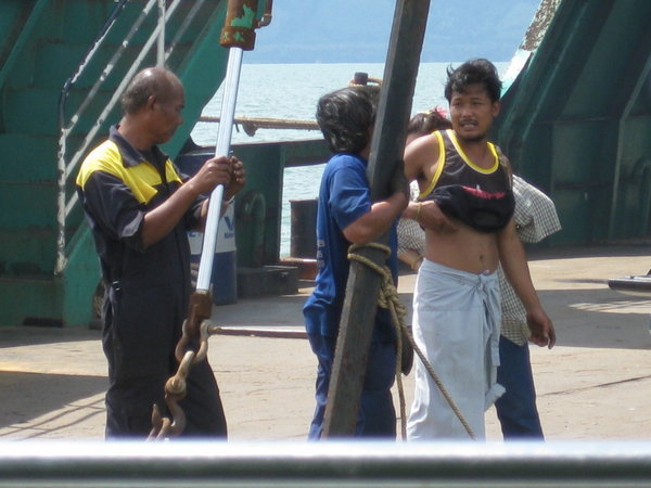 men fixing the ferry