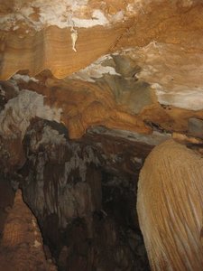 near the mouth of the cave