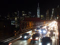 Rush hour on Brooklyn Bridge, with the Freedom Tower behind