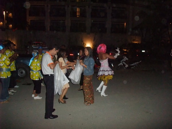 Our kathoey (ladyboy) leading the procession to celebrate the final countdown of 2008 on the beach 