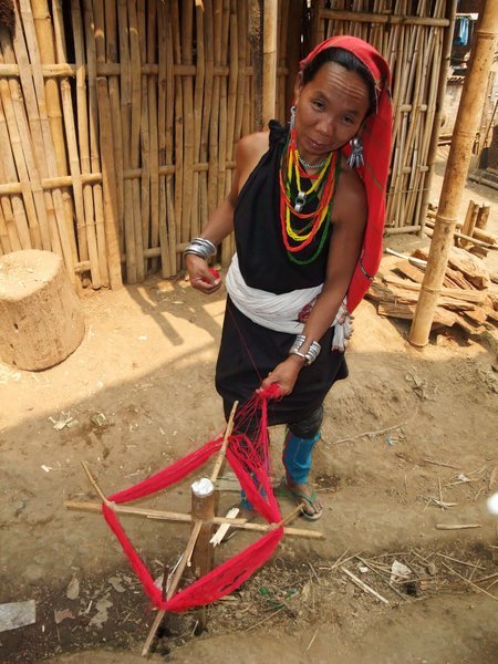Kayah woman preparing for weaving