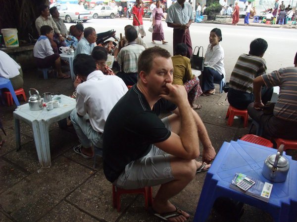 Matt waiting to exhange money at Mahbandoola Road