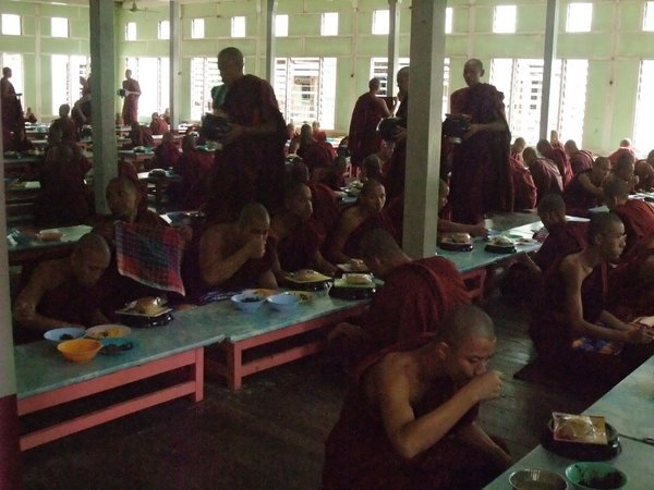 Monks eating their last meal for the day