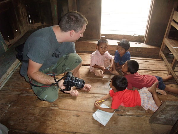 Matt with children learning in Bagaya Kyaung