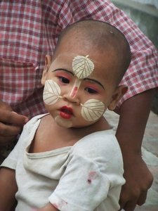Beautiful baby wearing tanaka makeup 