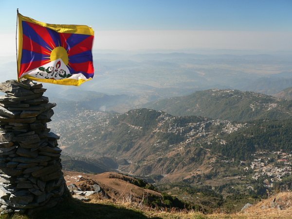 Tibetan flag & view of Mcleod Ganj