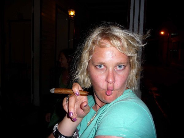 Warning. Smoking cigars can lead to silly faces.