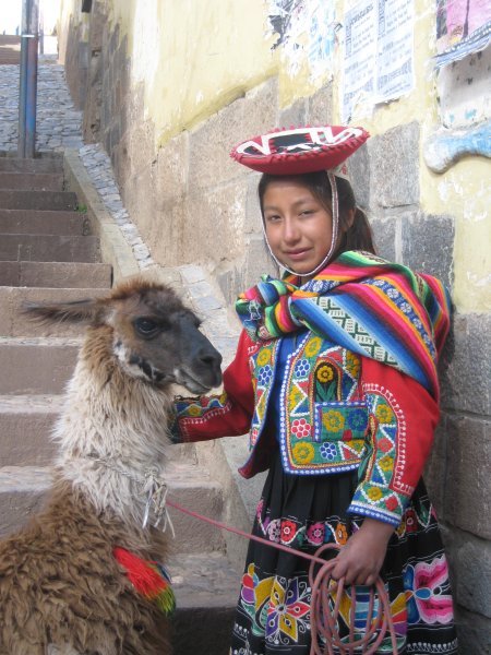 A Cusco local plus her llama