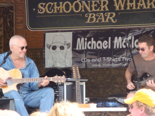 Michael McCloud - still strumming and humming at the Schooner Warf