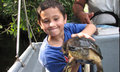 Junior with a Tortuguero canal turtle (tortuga)