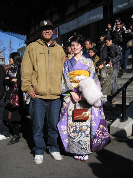 Hiroshi-san and Yuko-san leaving Senso-Ji temple.  