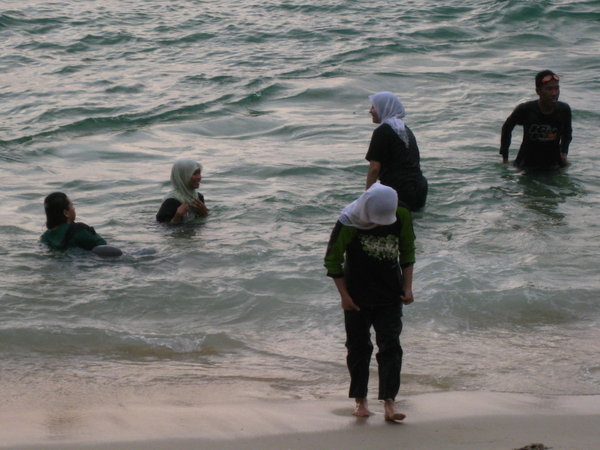 Pulau Pangkor: Locals playing in the surf