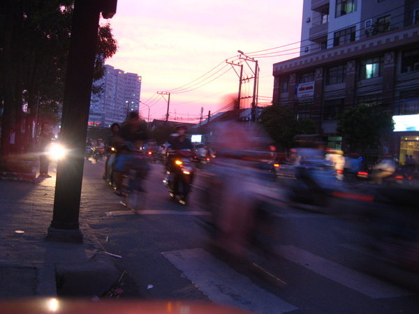 sunset and rush hour in ho chi minh city