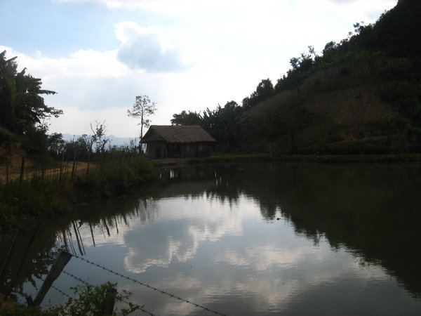 lake with chalet in xiengkhouang