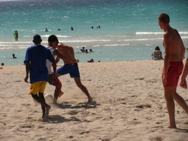 Beach soccer against the locals...