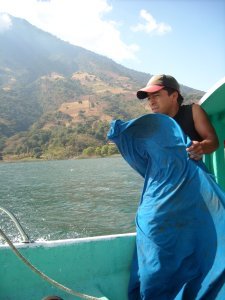 Taking a hit for the team, boat ride to Santiago Atitlan