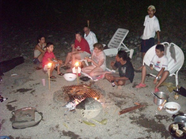 Gringos and locals in Dos Brazos having a Xmas Eve BBQ on a small island by the Rio Tigre