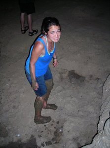 Gina covered in mud and bat feces