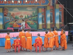 Monks watching a performance