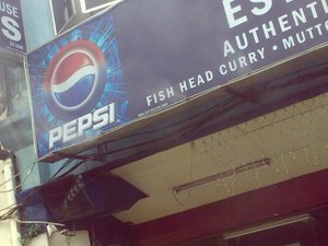 Mist coming out of Pepsi sign