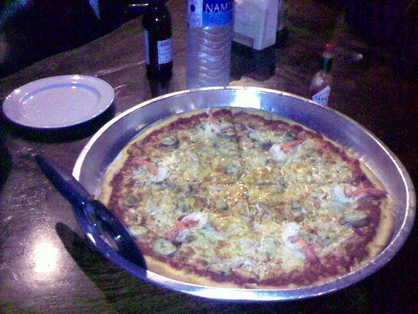 Big Pizza, check out the beer in the background! It was big!