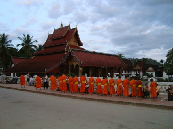 Monks receiving their alms
