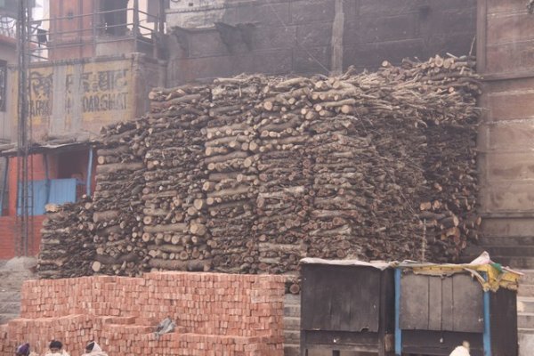 wood for burning bodies at a ghat along the ganges