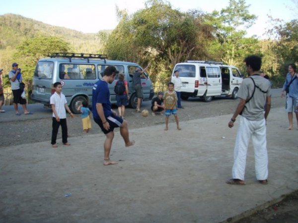 Playing keepy ups with the locals