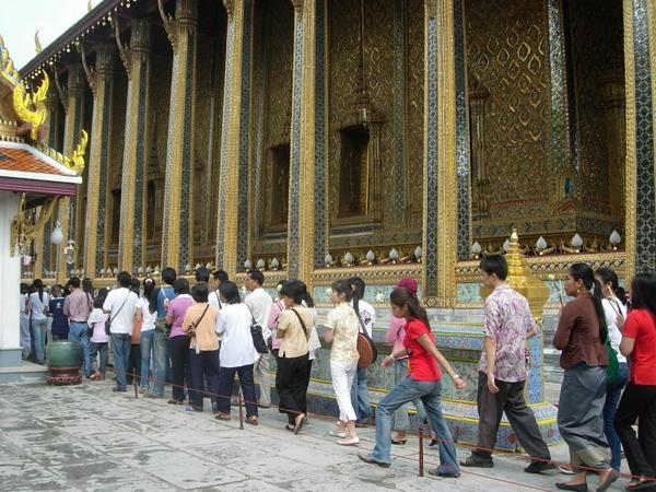 Throngs of worshippers inside the palace
