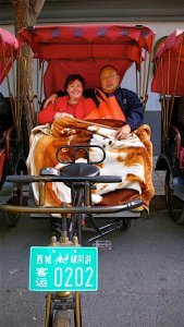 Melinda and Ernest in a Rickshaw