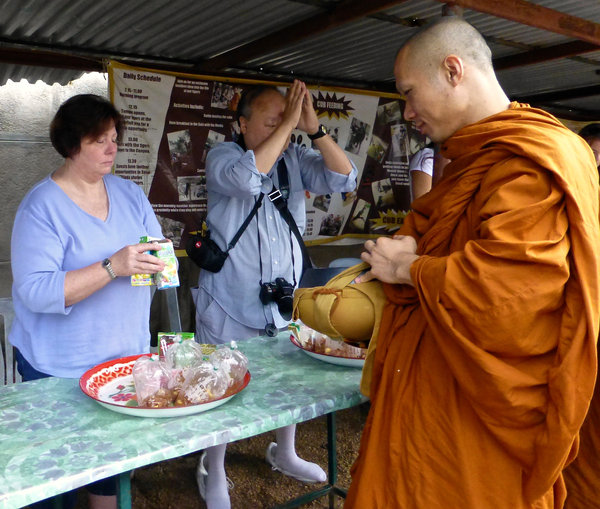 giving alms to Monks