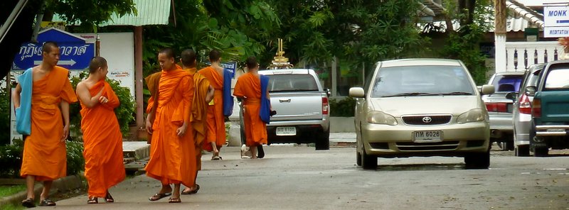 Monks going out to get alms