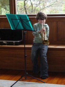 Cameron practising his trumpet