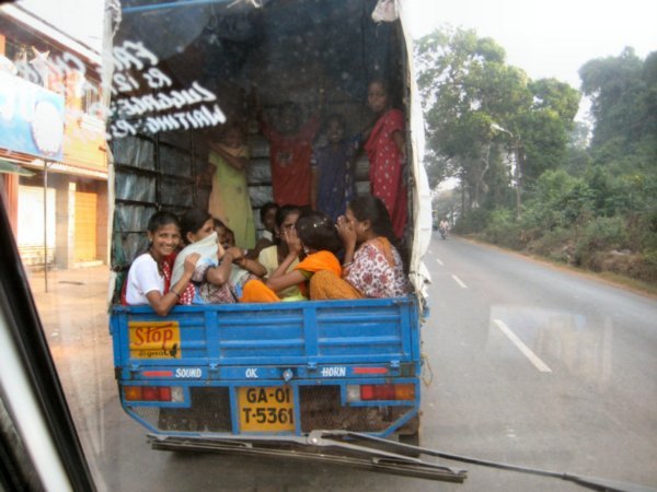 We wave and say hello to this truck full of Indian girls