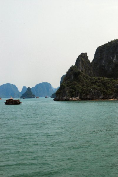 Approaching the island with Thien Cung Cave