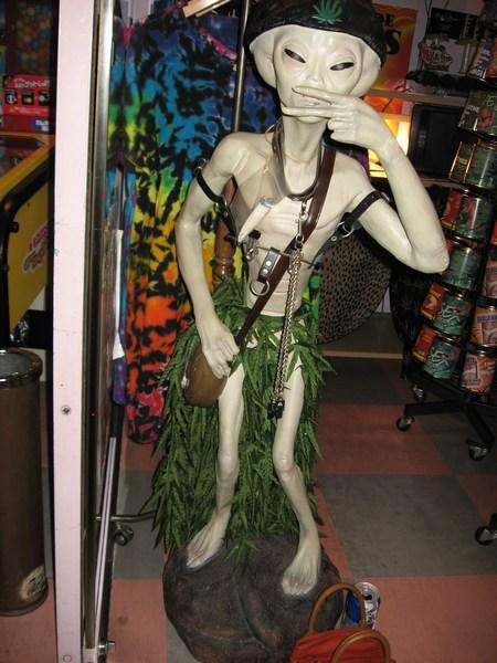 In the clubs area Roppongi, a smoking pot alien.