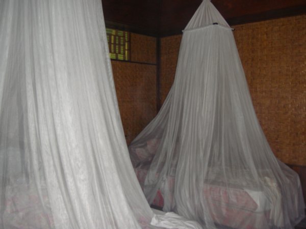 Our beds closed with mosquito nets