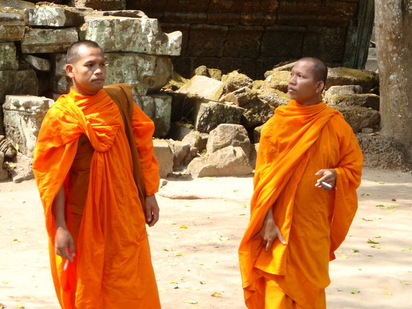 monks having a sly cigarette 