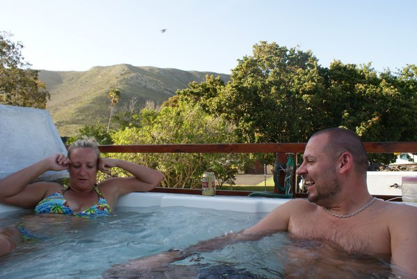 Lynn and Eds in Jacuzzi at the Zoete Inval backpackers in Hermanus Bay