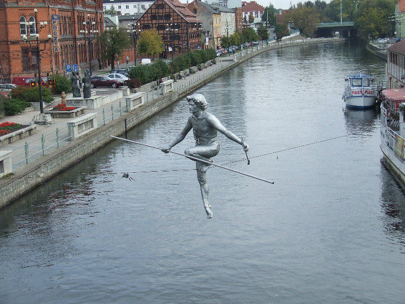 'Man crossing the river' statue