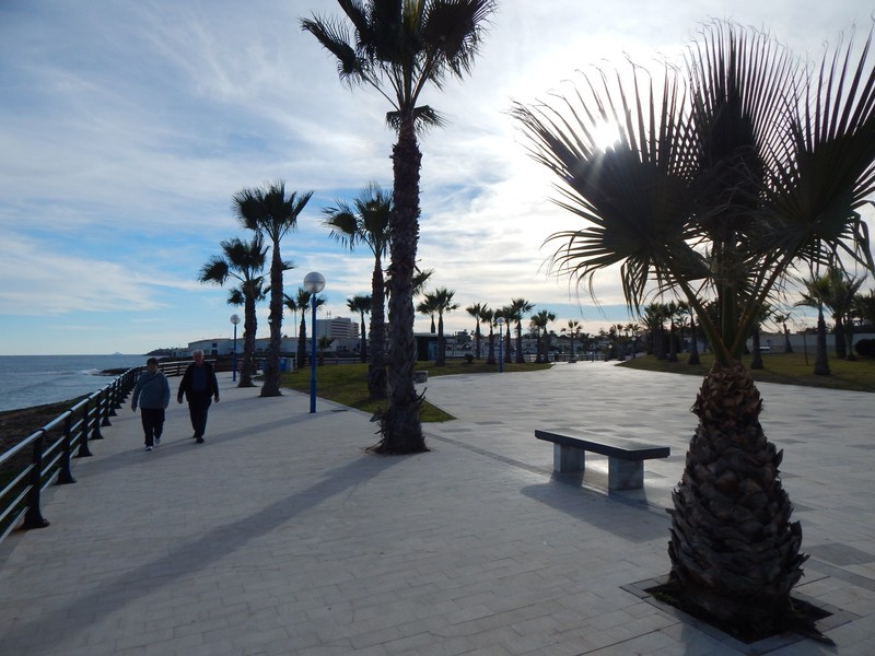 Walking along the promenade in the sunshine