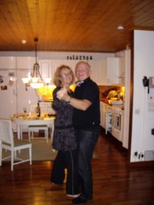 Mum and dad dancing in the kitchen.