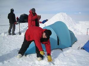 Jerome and Richard S setting up tents