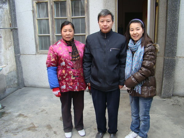 The Wang Family -- Mr., Mrs. & Dong Ping