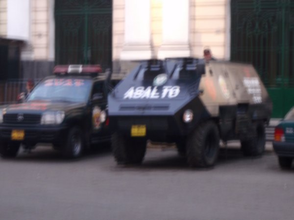 police and tank-like cars