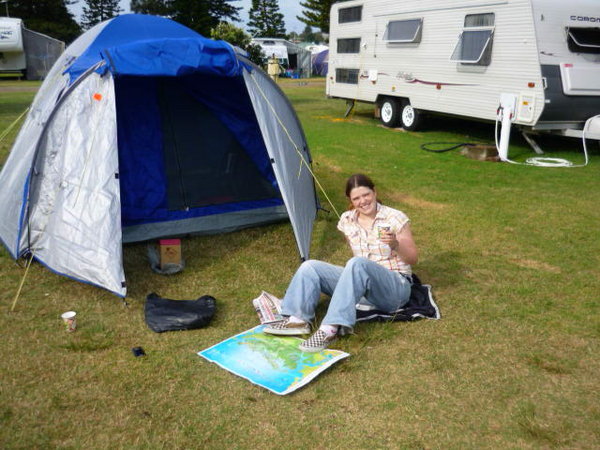 The (badly erected) tent pre-collapse, and me with a cheeky vino, served it Xmas paper cup :)