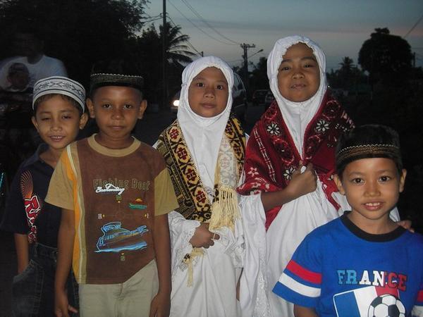 Neighborhood kids heading to the Mosque